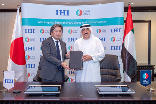 IHI and ENOC executives sign the new agreement to explore solar-to-ammonia production near Dubai. Source: IHI Corp.